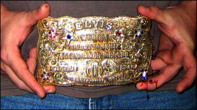 Holding Elvis Belt Buckle for scale Holding Elvis Belt Buckle for scale